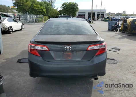 2012 Toyota Camry Base z USA, uszkodzony, nr VIN 4T1BF1FK3CU149016